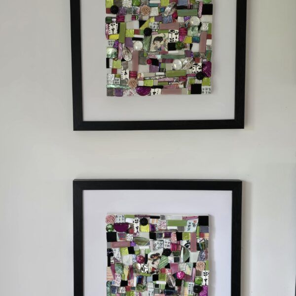 Two glass mosaic creations in black frames.