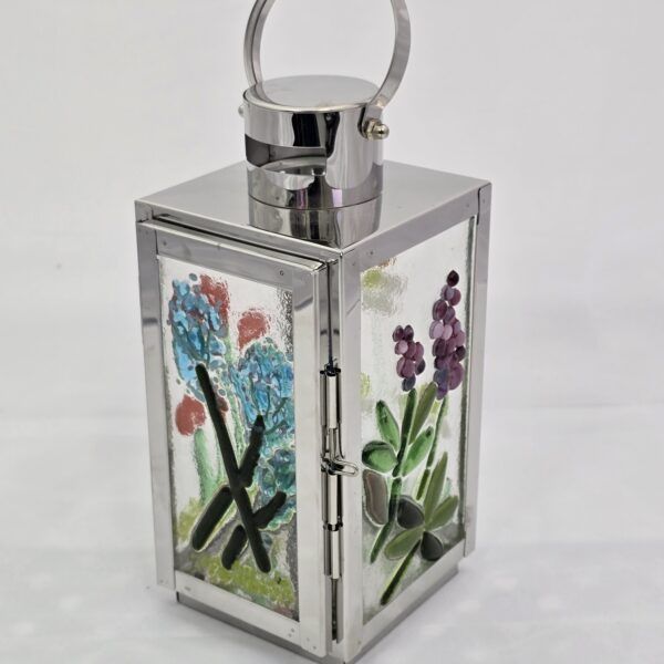 4 sided glass lantern with images on flowers.