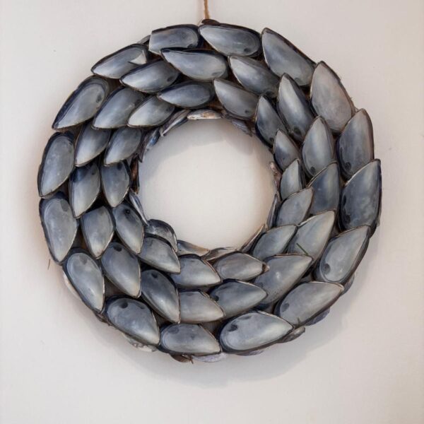 Wreath like circle made from mussel shells.