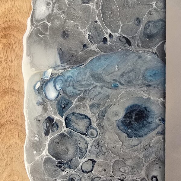 Close up of grey/blue effect on cheeseboard.