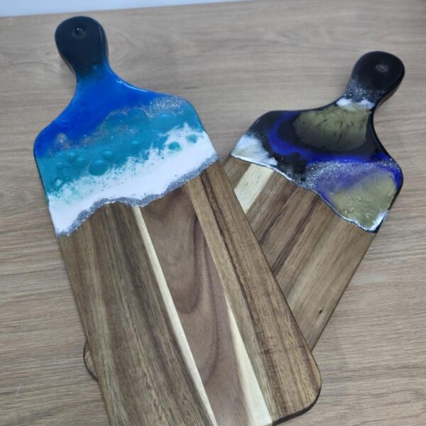 2 boards with blue resin at top of each.