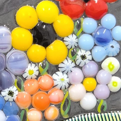 Fused glass in colourful flowers pattern.